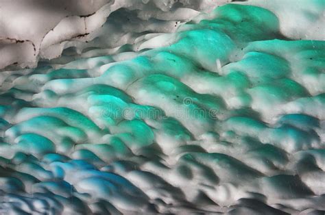 Ice Cave With Turquoise Crystals Near Blanca Lake Tourist Attraction