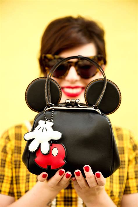 Disney x Coach Collection: Mickey Kisslock Bag | Disney handbags ...