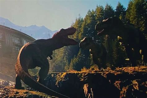 An Image Of Dinosaurs Fighting In The Wild