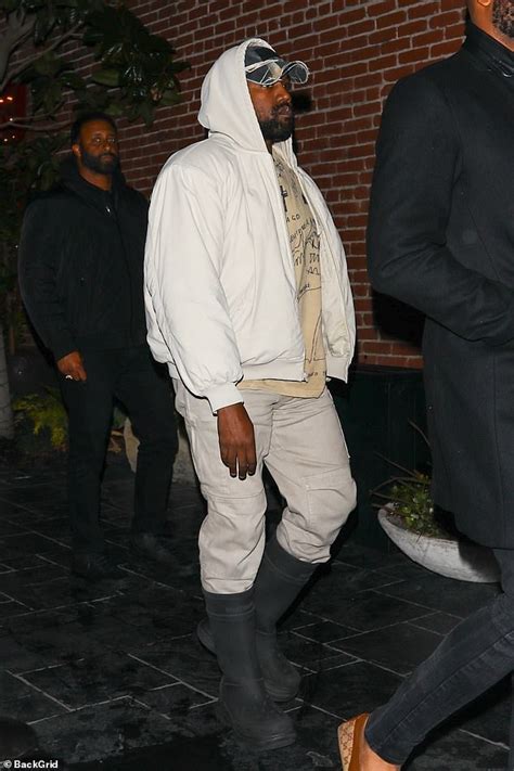 Kanye West Opts For A Low Key Look While Girlfriend Juliana Nalu Displays Her Taut Abs For La