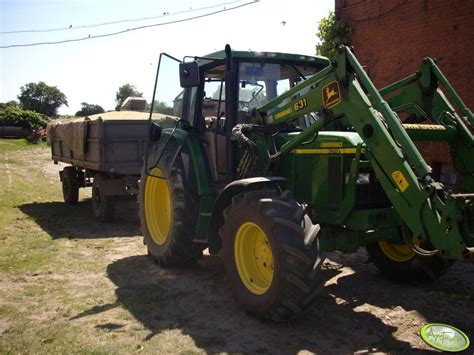 Fotografia ciagnik John Deere 6210 z przyczepą 88062 Galeria