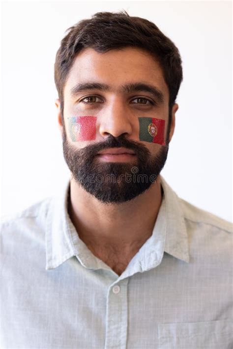 Vertical Image Of Serious Multiracial Man With Flags Of Portugal On