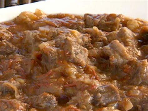 Goat Stew Recipe | Robert Irvine | Food Network