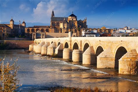 Cordoba with Roman bridge and Mosque-cathedral Stock Photo | Adobe Stock