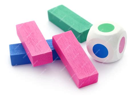 Premium Photo Jenga Game Of Colorful Wooden Blocks With Dice Over