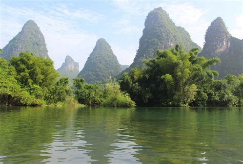 Yangshuo karst mountains: exploring it on bicycles and a bamboo raft