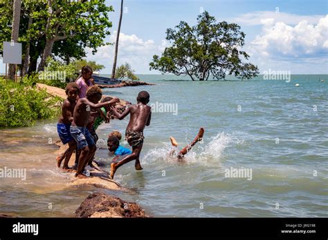 Torres Strait Island Children Play In King Tides Off Low Lying Saibai