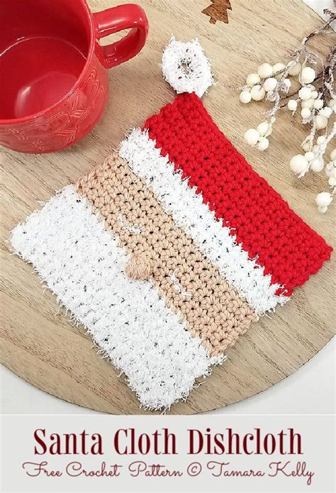 A Crocheted Dishcloth Is Sitting On A Table Next To A Red Mug