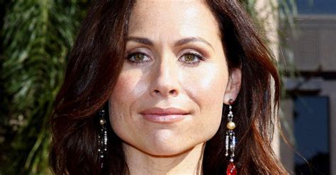 Classy Minnie Driver Stuns In Black Bikini Photos