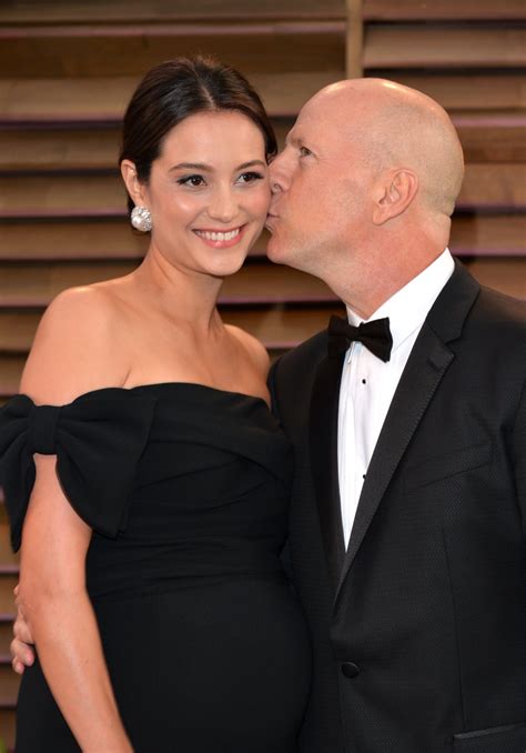 Emma Heming And Bruce Willis Kiss