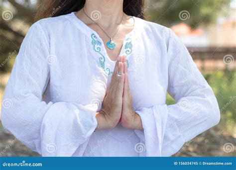woman  namaste gesture close  practicing yoga  meditation