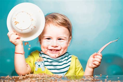 Baby Eating, Funny Baby Face with Plate. Stock Photo - Image of baby ...