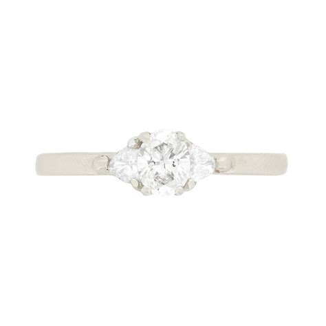 Contemporary 0.30ct Oval and Trillion Cut Diamond Solitaire Engagement ...