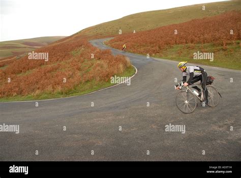 Cycling on Road Elan Valley Mid Wales Stock Photo - Alamy