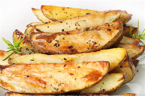 Shot Of Roasted Rosemary Garlic Potato Wedges