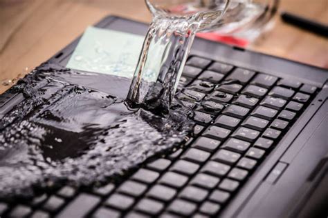 Water Spill Laptop Stock Photos, Pictures & Royalty-Free Images - iStock