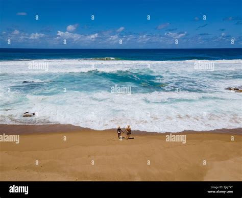 St Lucia South Africa Rocks Sand Ocean And Blue Coastal Skyline At