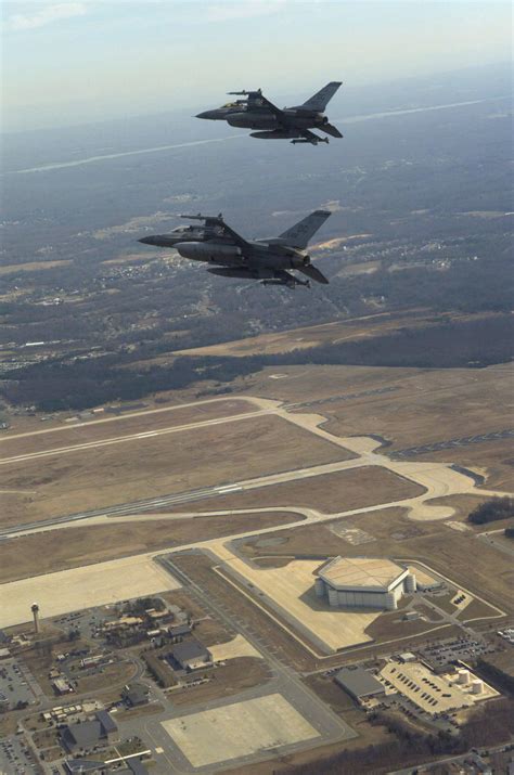 Two US Air Force (USAF) F-16C Fighting Falcon aircraft from the 121st Fighter Squadron, 113th ...