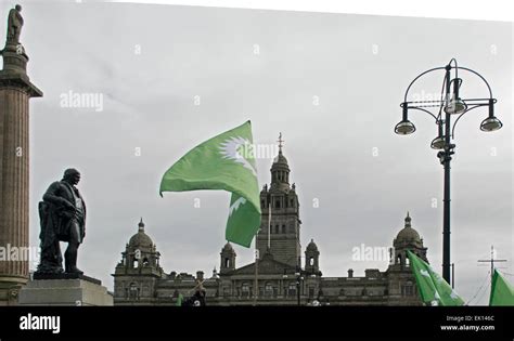 Scottish Green Party flags above George Square, Glasgow Stock Photo - Alamy