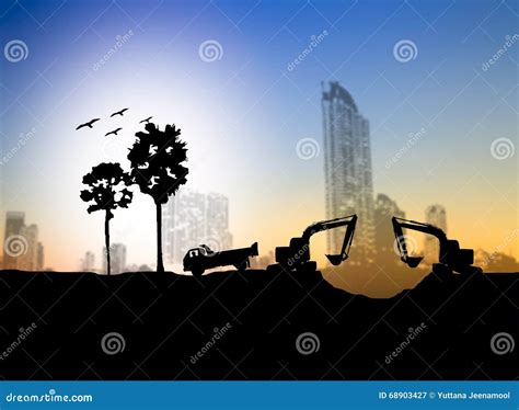 Silhouette Loaders and Trucks in a Construction Site Over Blurr Stock ...