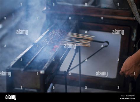 Chicken Satay Grill At A Busy Street Food Market Stock Photo Alamy