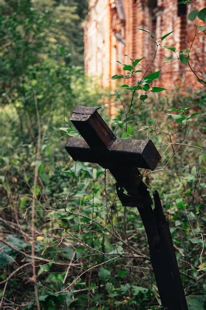 Premium Photo Old Cross On A Derelict Cemetery Broken Cross