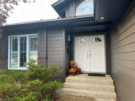 Hardie Rich Espresso Siding Renovation — Blue Jay Exterior Renovations