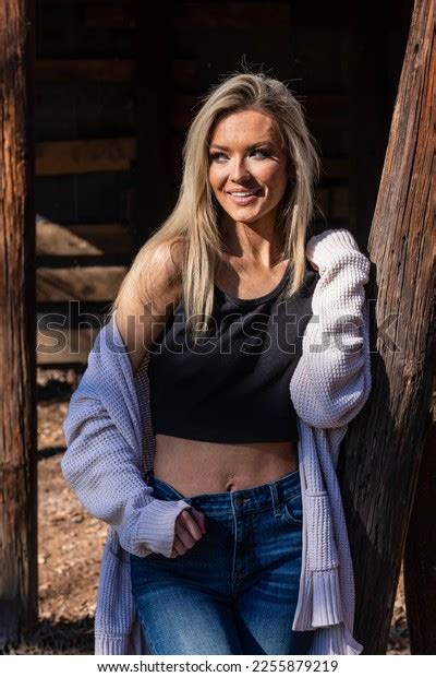 Gorgeous Blonde Cowgirl Model Poses Outdoors Stock Photo 2255879219
