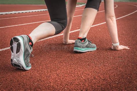 Athlete Woman At Starting Line Ready To Run Stock Photo Image Of