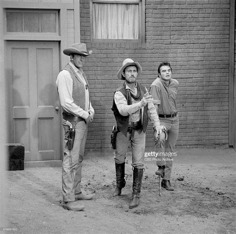 James Arness As Matt Dillon Ken Curtis As Festus Haggen And Burt In