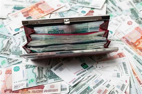 Red purse full of Russian money, lots of money - Stock Image - Everypixel