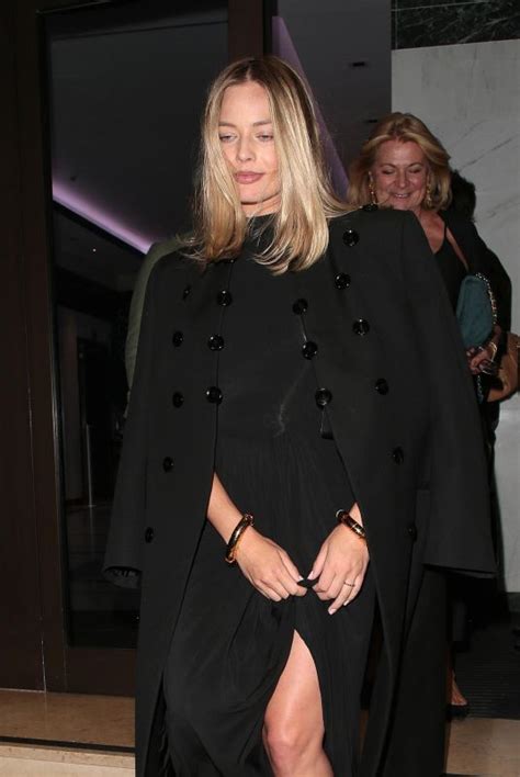 Pregnant MARGOT ROBBIE Leaves Roof Gardens in London 07/11/2024