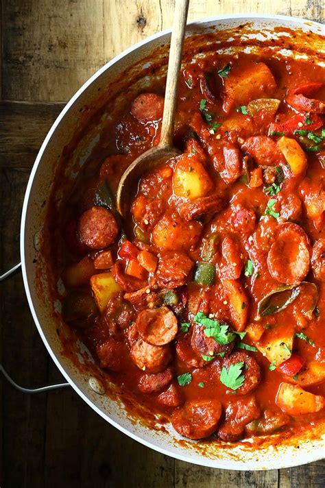 Potato And Sausage Stew Serving Dumplings