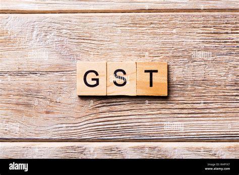 Gst Word Written On Wood Block Gst Text On Wooden Table For Your