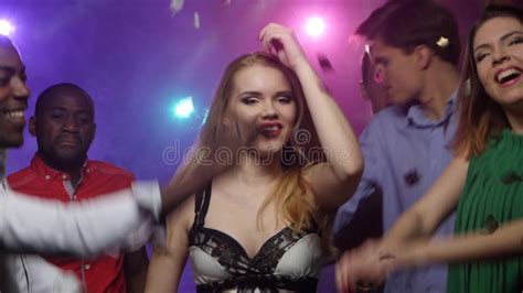 Blonde Girl Dancing Spinning Around Itself Close Up Slow Motion Stock