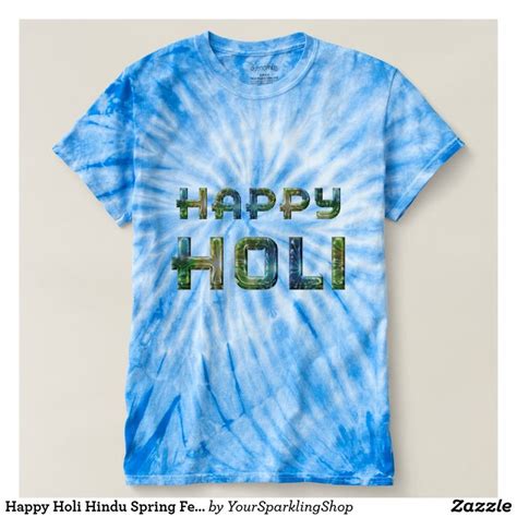 a t - shirt with the words happy holi on it in green and blue