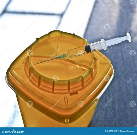 Needle Disposal Box - Hazard Stock Photo - Image: 34252360