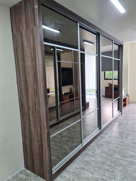 Customisable Swing Or Sliding Wardrobe Living Solution Pte Ltd