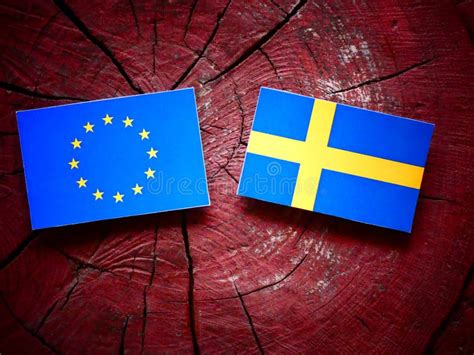 EU Flag with Swedish Flag on a Tree Stump Stock Photo - Image of ...