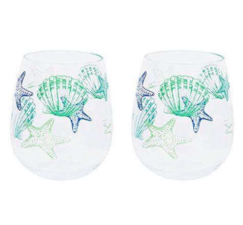 Two Wine Glasses With Shells And Starfishs Painted On The Bottom One Is