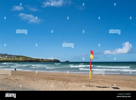 A red and yellow safety flag indicating the swim zone area on Fistral