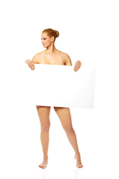 Premium Photo Naked Woman Holding Blank Placard Against White Background