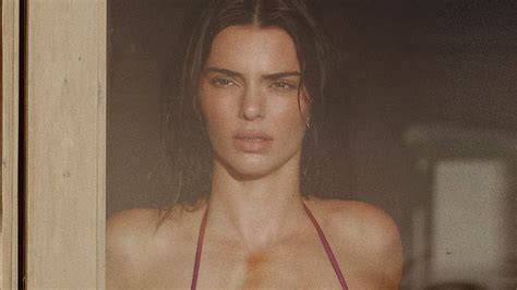 Kendall Jenner Models A Burgundy Brazilian String Bikini By The Ocean