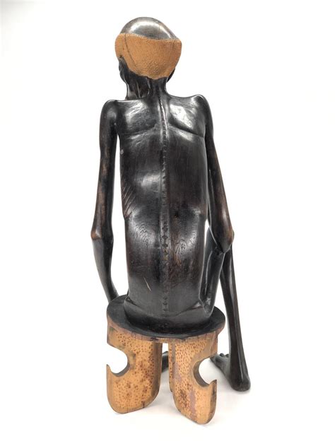 Lot VINTAGE AFRICAN HAND CARVED WOOD SEATED MALE NUDE SCULPTURE