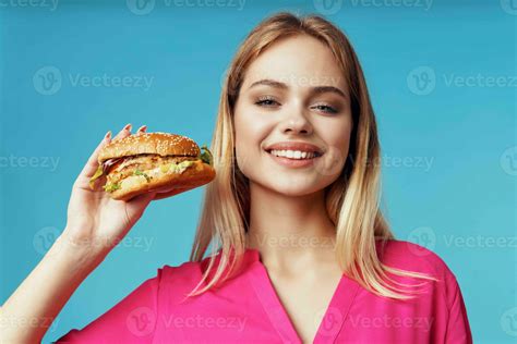 Cheerful Blonde Fast Food Snack Emotion Blue Background 23656791 Stock Photo At Vecteezy