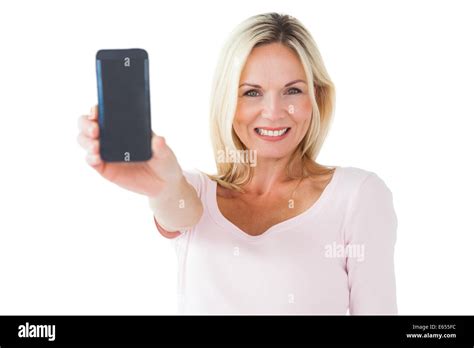 Happy Blonde Showing Her Smartphone Stock Photo Alamy