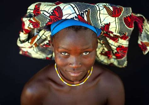 Angola Portrait Of A Mucubal Tribe Women Wearing Colorful Headwears