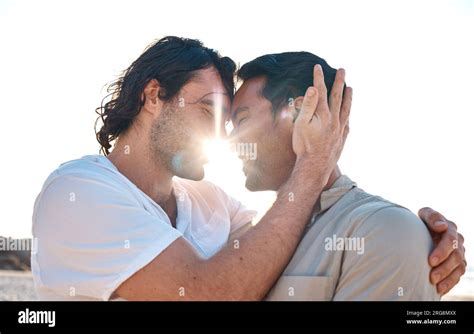 Love Embrace And Sun Gay Couple On Beach Smile And Fun On Summer Vacation Together In