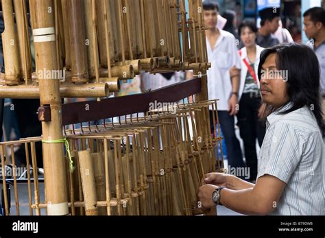 Man playing traditional angklung, Central Market, Kuala Lumpur ...