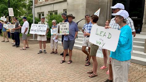 Groups gather at city hall to protest rezoning, urge climate action